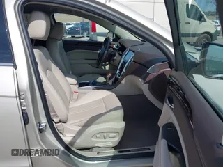 2015 Cadillac SRX Luxury Collection with VIN 3GYFNEE32FS638242, listed as a IAAI auction lot 41866683 with 32,277 mi miles. Bid and sale history available at carsss.com. Image 5.