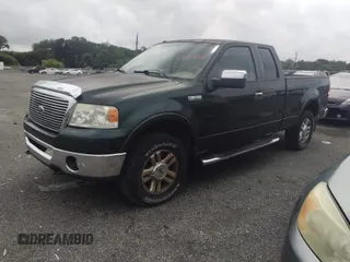 2007 Ford F-150 XLT with VIN 1FTPX14577NA13119, listed as a IAAI auction lot 42691232 with 165,968 mi miles and . Bid and sale history available at DreamBid. Image 2.