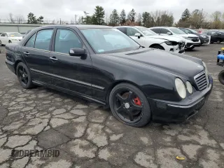 2002 Mercedes-Benz E with VIN WDBJF74J22B408004, listed as a Copart auction lot 52701805 with 240,246 mi miles and Clean Title. Bid and sale history available at DreamBid. Image 4.
