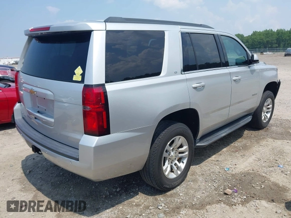2019 Chevrolet Tahoe LT with VIN 1GNSKBKC8KR363433, listed as a IAAI auction lot 42567045 with 122,956 mi miles and . Bid and sale history available at DreamBid. Image 4.