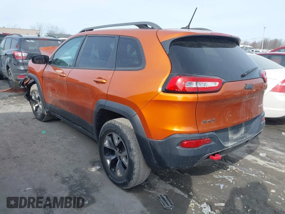 2015 Jeep Cherokee Trailhawk with VIN 1C4PJMBB3FW642266, listed as a IAAI auction lot 41510571 with 72,030 mi miles and . Bid and sale history available at DreamBid. Image 3.
