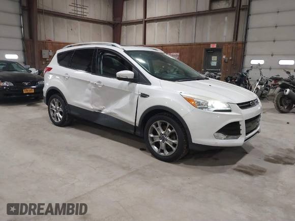2016 Ford Escape Titanium with VIN 1FMCU9J95GUB02377, listed as a IAAI auction lot 41869557 with 88,441 mi miles. Bid and sale history available at carsss.com. Image 1.