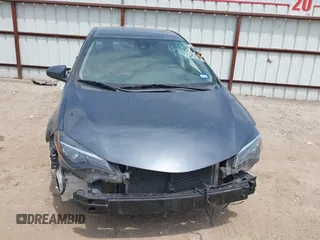 2019 Toyota Corolla L z VIN 5YFBURHE9KP863275, wystawiony jako IAAI lot #42045527 z przebiegiem 83 106 mil mil oraz . Historia ofert i sprzedaży dostępna na DreamBid. Obrazek 13.