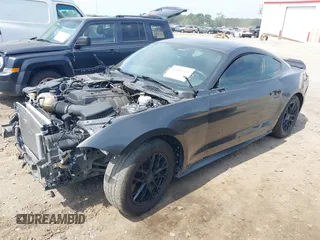 2019 Ford Mustang EcoBoost z VIN 1FA6P8TH0K5199276, wystawiony jako IAAI lot #42491713 z przebiegiem 135 710 mil mil oraz . Historia ofert i sprzedaży dostępna na DreamBid. Obrazek 18.