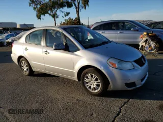 2012 Suzuki SX4 LE with VIN JS2YC5A33C6301529, listed as a Copart auction lot 79363394 with 72,348 mi miles and Clean Title. Bid and sale history available at carsss.com. Image 4.