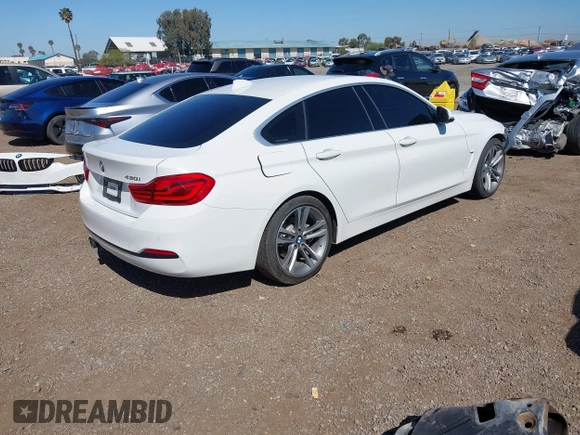 2019 BMW 4 Series 430i with VIN WBA4J1C54KBM18190, listed as a IAAI auction lot 42012759 with 73,598 mi miles. Bid and sale history available at carsss.com. Image 4.