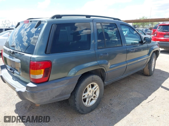 2003 Jeep Grand Cherokee Laredo with VIN 1J4GW48S53C571247, listed as a IAAI auction lot 42416174 with 175,328 mi miles and . Bid and sale history available at DreamBid. Image 4.