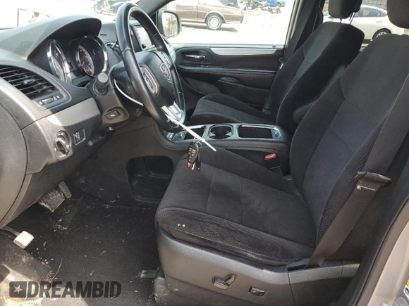 2014 Dodge Grand Caravan SXT with VIN 2C4RDGCG4ER114464, listed as a Copart auction lot 52480965 with 125,212 mi miles and Salvage Title. Bid and sale history available at DreamBid. Image 7.