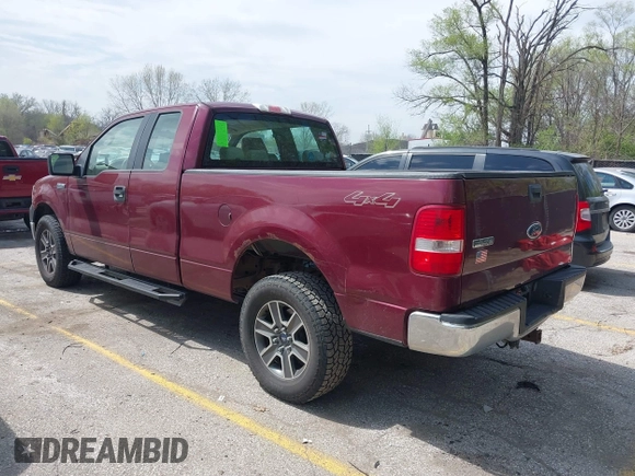 2005 Ford F-150 XLT with VIN 1FTPX14575KD79404, listed as a IAAI auction lot 42003073 with 212,050 mi miles. Bid and sale history available at carsss.com. Image 3.
