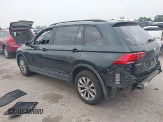 2019 Volkswagen Tiguan S with VIN 3VV1B7AXXKM002312, listed as a IAAI auction lot 42282809 with 80,781 mi miles and . Bid and sale history available at DreamBid. Image 3.