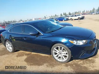2016 Mazda 6 i Touring with VIN JM1GJ1V58G1457729, listed as a IAAI auction lot 41869941 with 159,914 mi miles and . Bid and sale history available at carsss.com. Image 13.
