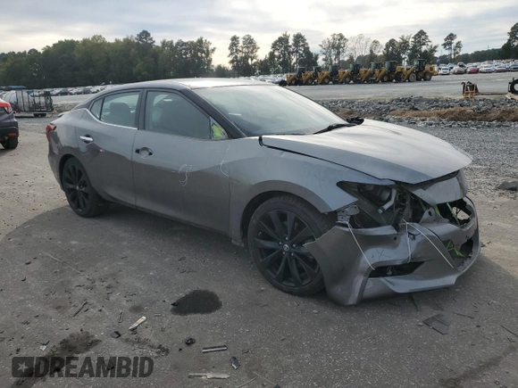 2017 Nissan Maxima Platinum with VIN 1N4AA6AP2HC415210, listed as a Copart auction lot 75491674 with 107,023 mi miles and Salvage title. Bid and sale history available at DreamBid. Image 4.