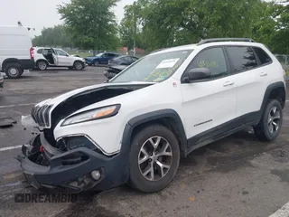 2016 Jeep Cherokee Trailhawk with VIN 1C4PJMBS4GW179121, listed as a IAAI auction lot 42516635 with 110,056 mi miles and . Bid and sale history available at DreamBid. Image 2.