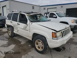 1997 Jeep Grand Cherokee Limited with VIN 1J4GX78YXVC716353, listed as a Copart auction lot 85207974 with 115,527 mi miles and Salvage Title. Bid and sale history available at carsss.com. Image 4.