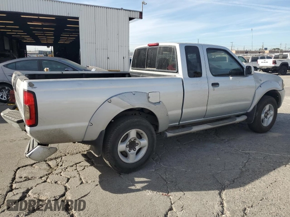 2001 Nissan Frontier SE Desert Runner with VIN 1N6ED26T11C345641, listed as a Copart auction lot 85855154 with 227,928 mi miles and Salvage title. Bid and sale history available at DreamBid. Image 3.