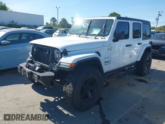 2018 Jeep Wrangler Unlimited Sahara z VIN 1C4HJXEG4JW106111, wystawiony jako IAAI lot #41994833 z przebiegiem 99 583 mil mil oraz . Historia ofert i sprzedaży dostępna na DreamBid. Obrazek 20.