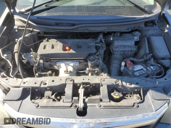 2012 Honda Civic LX z VIN 2HGFB2F53CH324712, wystawiony jako Copart lot #46248345 z przebiegiem 316 459 mil mil oraz Szkoda całkowita • Salvage title. Historia ofert i sprzedaży dostępna na DreamBid. Obrazek 11.