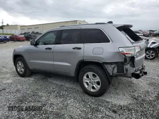 2014 Jeep Grand Cherokee Laredo with VIN 1C4RJEAG2EC179547, listed as a Copart auction lot 53328055 with 107,451 mi miles and Salvage Title. Bid and sale history available at DreamBid. Image 2.