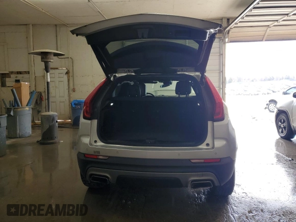 2021 Cadillac XT4 AWD Premium Luxury with VIN 1GYFZDR4XMF067733, listed as a Copart auction lot 47523055 with 109,727 mi miles and Salvage Title. Bid and sale history available at carsss.com. Image 6.