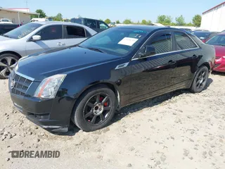 2009 Cadillac CTS RWD w/1SA with VIN 1G6DF577390128796, listed as a IAAI auction lot 42078153 with 257,757 mi miles. Bid and sale history available at carsss.com. Image 2.