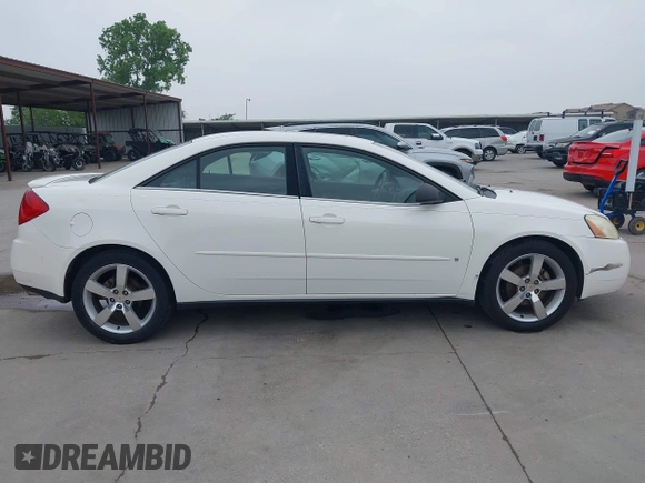 2006 Pontiac G6 GTP z VIN 1G2ZM551X64224909, wystawiony jako IAAI lot #42289564 z przebiegiem 193 418 mil mil oraz . Historia ofert i sprzedaży dostępna na DreamBid. Obrazek 13.