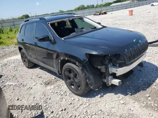 2021 Jeep Cherokee Altitude with VIN 1C4PJLLBXMD144549, listed as a Copart auction lot 62163435 with 94,571 mi miles and Salvage title. Bid and sale history available at DreamBid. Image 4.