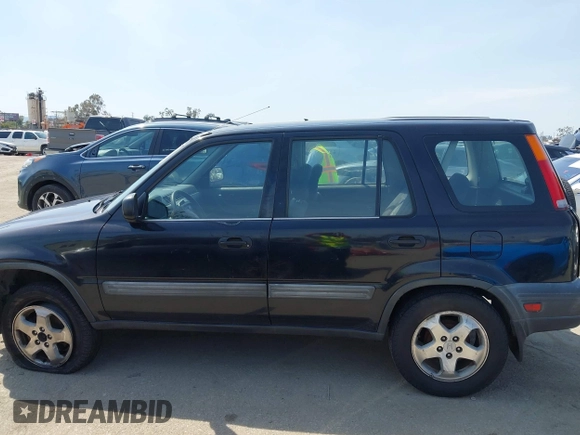 1999 Honda CR-V LX with VIN JHLRD2844XC011920, listed as a IAAI auction lot 41820203 with 224,967 mi miles. Bid and sale history available at carsss.com. Image 15.