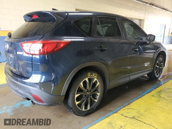 2016 Mazda CX-5 Grand Touring with VIN JM3KE4DY0G0813499, listed as a Copart auction lot 54174805 with 116,709 mi miles and Clean Title. Bid and sale history available at carsss.com. Image 3.