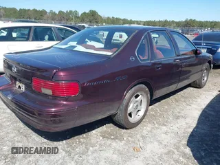 1996 Chevrolet Caprice Classic 1SA Special Value Pkg with VIN 1G1BL52P7TR146198, listed as a IAAI auction lot 41746994 with 1 mi miles. Bid and sale history available at carsss.com. Image 4.
