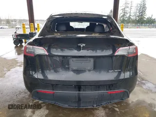 2023 Tesla Model Y Long Range with VIN 7SAYGAEE7PF739924, listed as a IAAI auction lot 41612323 with 75,226 mi miles and . Bid and sale history available at DreamBid. Image 15.