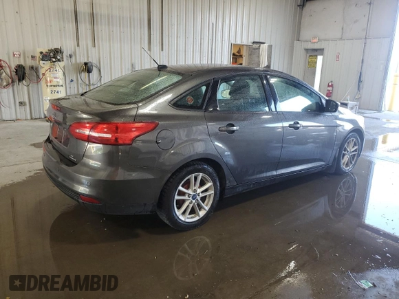 2015 Ford Focus SE with VIN 1FADP3F29FL310622, listed as a Copart auction lot 63591065 with 119,957 mi miles and Salvage title. Bid and sale history available at DreamBid. Image 3.