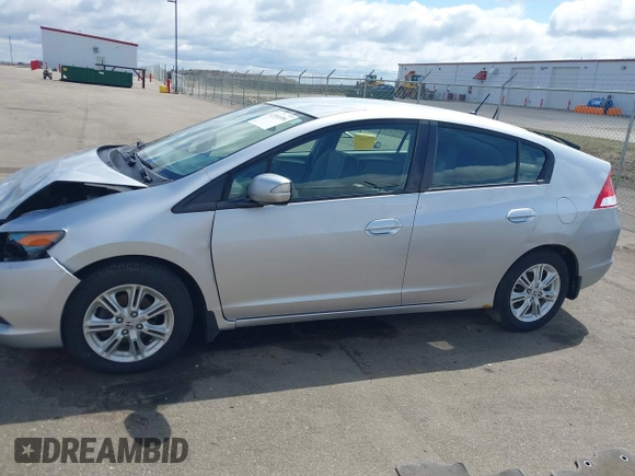 2010 Honda Insight EX with VIN JHMZE2H71AS017996, listed as a IAAI auction lot 42091356 with 142,474 mi miles and . Bid and sale history available at DreamBid. Image 14.