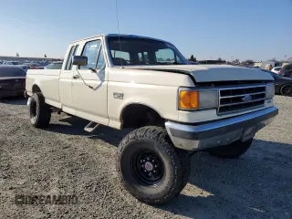 1991 Ford F-250 with VIN 1FTHX26M1MKA14231, listed as a Copart auction lot 41796005 with 6,983 mi miles and Salvage Title. Bid and sale history available at carsss.com. Image 4.