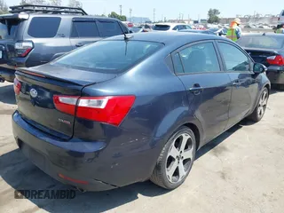 2013 Kia Rio EX with VIN KNADN4A34D6285224, listed as a IAAI auction lot 42790230 with 108,071 mi miles and . Bid and sale history available at DreamBid. Image 4.