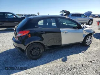 2012 Mazda 2 Sport with VIN JM1DE1KZ2C0149132, listed as a Copart auction lot 45177385 with 146,966 mi miles and Salvage Title. Bid and sale history available at DreamBid. Image 3.