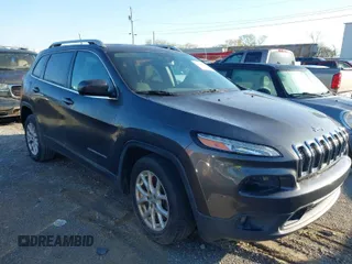 2016 Jeep Cherokee 75th Anniversary with VIN 1C4PJLCB9GW113611, listed as a IAAI auction lot 41884616 with 128,243 mi miles. Bid and sale history available at carsss.com. Image 1.