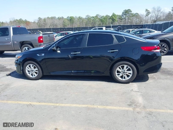 2018 Kia Optima S with VIN 5XXGT4L36JG221671, listed as a IAAI auction lot 41704040 with 136,815 mi miles. Bid and sale history available at carsss.com. Image 14.