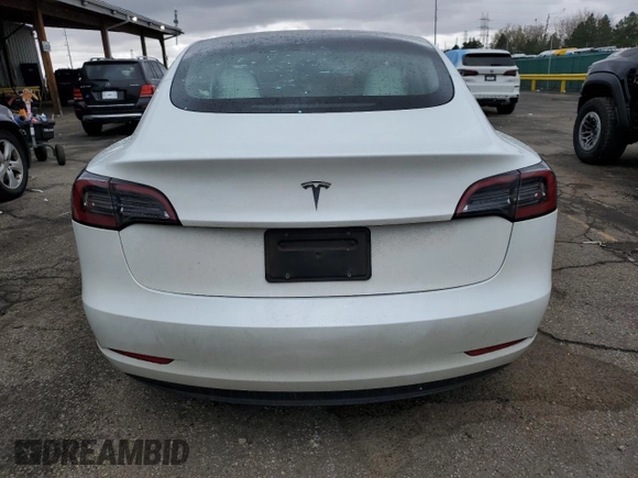 2023 Tesla Model 3 with VIN 5YJ3E1EAXPF600008, listed as a Copart auction lot 51868055 with 58,733 mi miles and Salvage title. Bid and sale history available at DreamBid. Image 6.