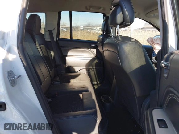 2014 Jeep Compass Latitude with VIN 1C4NJCEB0ED660019, listed as a IAAI auction lot 41200065 with 185,174 mi miles. Bid and sale history available at carsss.com. Image 8.