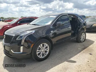 2024 Cadillac XT5 FWD Luxury with VIN 1GYKNAR42RZ731988, listed as a Copart auction lot 72777544 with 5,965 mi miles and Salvage title. Bid and sale history available at DreamBid. Image 1.