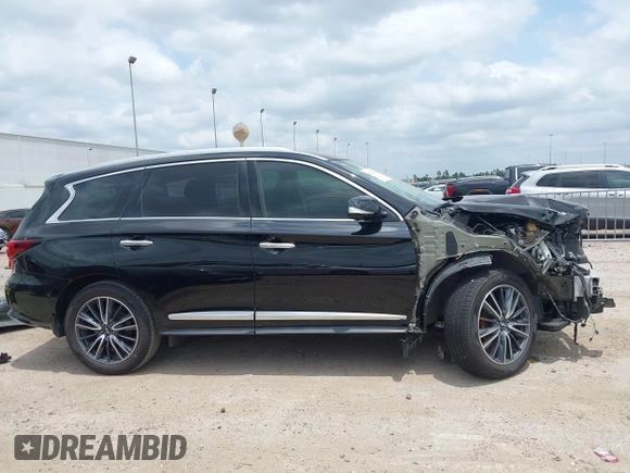 2020 Infiniti QX60 Pure with VIN 5N1DL0MM3LC524411, listed as a IAAI auction lot 42292734 with 51,221 mi miles and . Bid and sale history available at DreamBid. Image 14.