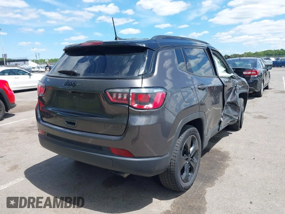 2018 Jeep Compass Latitude with VIN 3C4NJDBB0JT454598, listed as a IAAI auction lot 42318972 with 42,848 mi miles and . Bid and sale history available at DreamBid. Image 4.