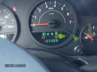 2009 Jeep Wrangler X with VIN 1J4FA24179L711352, listed as a IAAI auction lot 42577898 with 133,309 mi miles and . Bid and sale history available at DreamBid. Image 7.