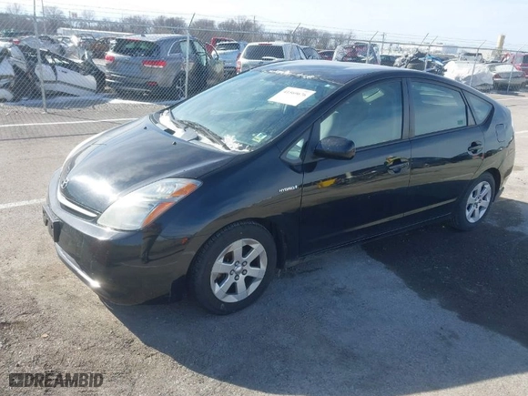 2008 Toyota Prius with VIN JTDKB20U983407150, listed as a IAAI auction lot 41569676 with 238,528 mi miles. Bid and sale history available at carsss.com. Image 2.