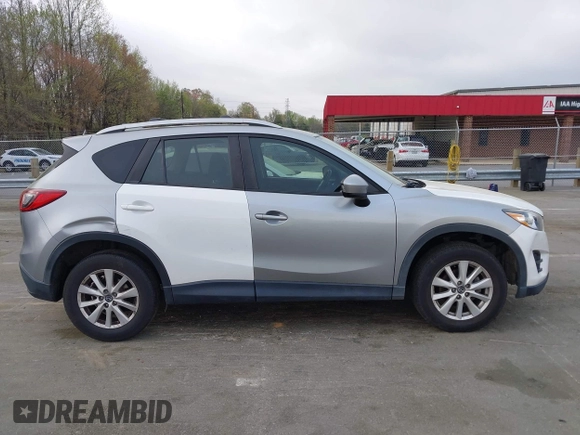2013 Mazda CX-5 Touring with VIN JM3KE2CE0D0105115, listed as a IAAI auction lot 41899956 with 301,264 mi miles. Bid and sale history available at carsss.com. Image 13.