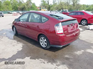 2005 Toyota Prius with VIN JTDKB20U957010252, listed as a IAAI auction lot 42119577 with 117,717 mi miles. Bid and sale history available at carsss.com. Image 3.