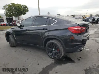 2017 BMW X6 sDrive35i with VIN 5UXKU0C36H0G69163, listed as a Copart auction lot 87044784 with 99,452 mi miles and Salvage Title. Bid and sale history available at carsss.com. Image 2.