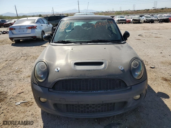 2010 MINI Cooper Hardtop S with VIN WMWMF7C53ATZ73189, listed as a Copart auction lot 75908234 with 67,823 mi miles and Clean Title. Bid and sale history available at carsss.com. Image 5.