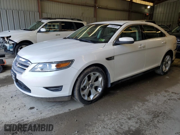 2012 Ford Taurus SEL z VIN 1FAHP2HW8CG133657, wystawiony jako Copart lot #52865895 z przebiegiem 132 876 mil mil oraz Szkoda całkowita • Salvage title. Historia ofert i sprzedaży dostępna na DreamBid. Obrazek 1.