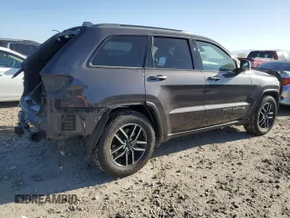 2019 Jeep Grand Cherokee Trailhawk with VIN 1C4RJFLT1KC541766, listed as a Copart auction lot 52571995 with 68,570 mi miles and Salvage title. Bid and sale history available at DreamBid. Image 3.